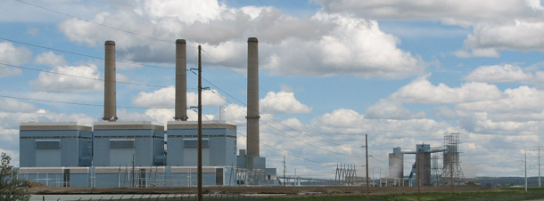 The Laramie River Station coal-fired power plant north of Cheyenne, WY, produces about 15 million tons of carbon dioxide a year. The Congressional Budget Office announced on Friday that the average American household would spend only a very modest amount each year to reduce global warming pollution under H.R. 2454. (AP/Bob Moen)