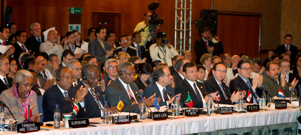 Heads of state and authorities from countries members of the Organization of American States, OAS, attends the 39th General Assembly in San Pedro Sula, Honduras on June 3, 2009. The OAS announced Wednesday it has revoked a 1962 measure suspending communist Cuba, but it is questionable whether the Castro administration wishes to join the Inter-American system. (AP/Eduardo Verdugo)