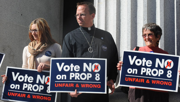 Rev. Michael Schuenemeyer, center, rallies against California's Proposition 8 with others on October 21, 2008, at City Hall in Oakland, CA. (AP/Ron Lewis)
