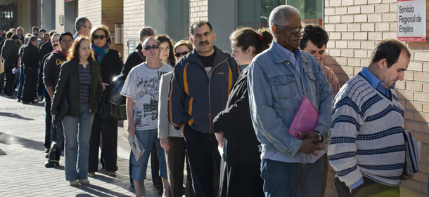 People line up to enter a government job center in Madrid, Spain, on May 4, 2009. The Center for American Progress will join world leaders this Thursday in Geneva, Switzerland to discuss the urgent need to strengthen labor and welfare institutions to better protect workers around the world. (AP/Daniel Ochoa de Olza)