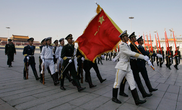 Chinese honor guard soldiers march against the backdrop of Tiananmen Square in Beijing on Wednesday, June 3, 2009, on the eve of the 20th anniversary of the protests that happened there in 1989. (AP/Elizabeth Dalziel)
