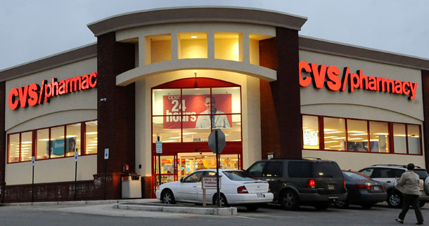 A customer approaches a CVS pharmacy in Saugus, MA, on February 18, 2009. CVS/Caremark is one of the three largest Pharmacy Benefit Managers, which is considered the only segment of the health insurance market that is unregulated by the Federal Trade Commission. (AP/Lisa Poole)