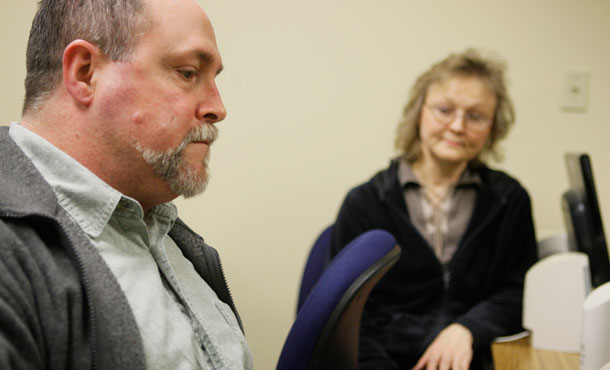 Jim Sundly, 53, who was laid off from his 20-year job that made electric motors participates in mock interviews with Tammy Adkins on Feb. 13, 2009. Since the Great Recession began in December 2007, there has been a sharp rise in the number of married couples where a woman is left to bring home the bacon because her husband is unemployed. (AP/M. Spencer Green)