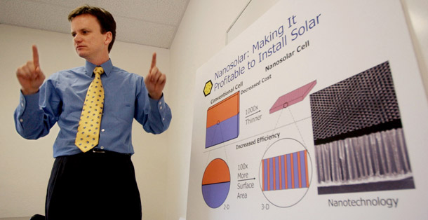 The CEO of Nanosolar explains their technology at offices in Palo Alto, California.  Venture capitalists are boosting investments in startups developing environmental technologies like this one. (AP/Paul Sakuma)