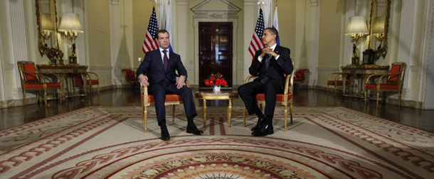 President Barack Obama, right, and President Dmitri Medvedev look on during their meeting of the G-20 summit in London on April 1, 2009. (AP/Charles Dharapak)