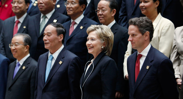 Vice Premier Wang Qishan, Secretary of State Hillary Rodham Clinton, Treasury Secretary Timothy Geithner, and other pose for a photo at the start of the U.S.-China Strategic and Economic Dialogue in Washington. (AP/Gerald Herbert)