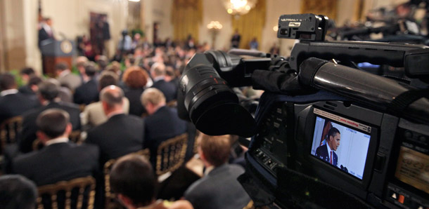 President Barack Obama answers questions during a news conference in the East Room of the White House on Wednesday, July 22 as cameras look on. (AP/Alex Brandon)