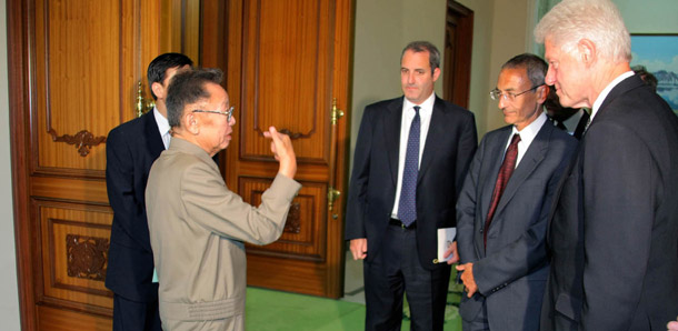 Former President Bill Clinton, CAP President CEO and founder John Podesta, and North Korean leader Kim Jong Il meet in Pyongyang on August 4, 2009. (AP/Korean Central News Agency via Korea News Service)