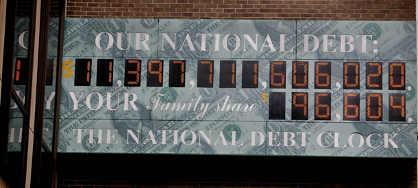 The national debt clock is shown in New York City on July 3, 2009. The best way to measure debt is not in total dollars but as a comparison to the economy’s total size, known as the debt-to-GDP ratio. (AP/Yanina Manolova)