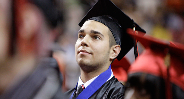 A high school student sits at his graduation in Mellon Arena in Pittsburgh, Pennsylvania. (AP/Gene J. Puskar)