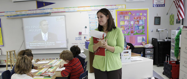 A fourth-grade teacher monitors her class as they listen to a nationwide back-to-school address by President Barack Obama in Hollywood, FL. The Obama administration has proposed a dramatic increase in funding for the Teacher Incentive Fund, or TIF, from $97 million this year to $487.3 million in fiscal year 2010. (AP/Lynne Sladky)