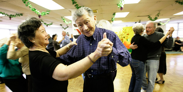 Seniors dance during the social dancing program at the Amico senior citizen center in Brooklyn, New York. (AP/Mary Altaffer)