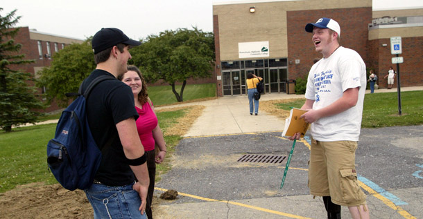 Students chat between classes at Pennsylvania Highlands Community College in Johnstown, PA. A centerpiece of the president's America's Graduation Initiative is to add an additional 5 million community college graduates to the nation’s workforce by 2020. Meeting this goal will require engaging more working learners. (AP/Lisa Kyle)