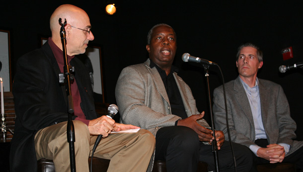 Ruy Teixeira, Sam Fulwood, and John Halpin sit on stage at the Progressivism on Tap event. (Campus Progress)