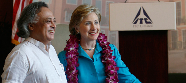U.S. Secretary of State Hillary Rodham Clinton and India's Junior Minister for Environment and Forests Jairam Ramesh discuss climate change during Clinton's visit to India in July. (AP/Mustafa Quraishi)