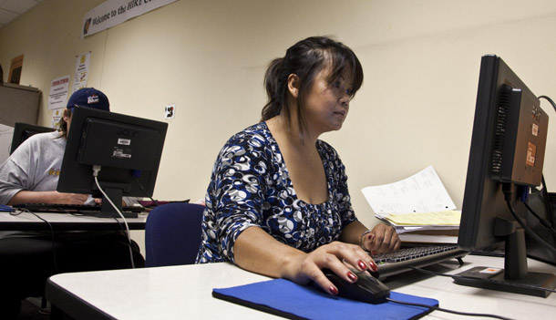 A woman works on a computer at the Milwaukee Hire Center in Milwaukee, WI. The average length of unemployment in September 2009 was 26.2 weeks, the median length of unemployment was 17.3 weeks, and 35.6 percent of the unemployed were out of a job for 27 weeks or more. All of these indicators are at their highest level since 1948. (AP/Morry Gash)