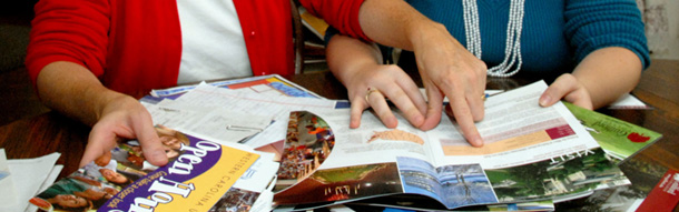 A mother and daughter peruse college brochures. (AP/Karen Tam)