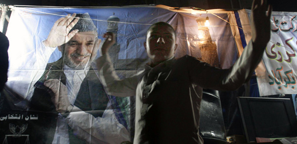 A supporter of Afghan President Hamid Karzai dances, as people celebrate Karzai's victory, in Herat, Afghanistan. (AP/Fraidoon Pooyaa)