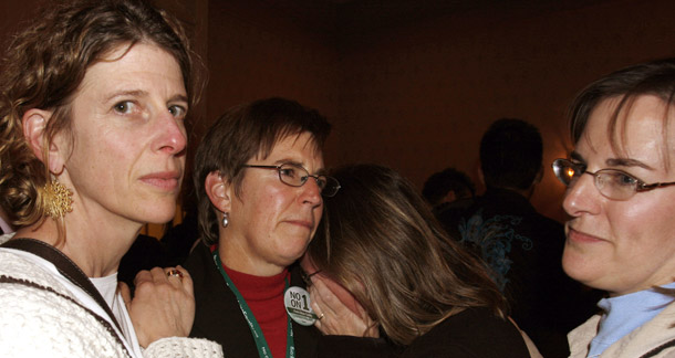 Friends in Portland, ME, console one another after learning that Maine voters rescinded the state legislature's approval of same-sex marriage. Despite the defeat voters in Kalamazoo, MI, and Washington State approved measures on gay and transgender equality. (AP/Pat Wellenbach)