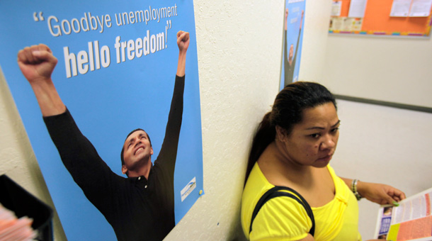 A woman waits to get help with her resume at JobTrain job training facility in Menlo Park, California. (AP/Paul Sakuma)