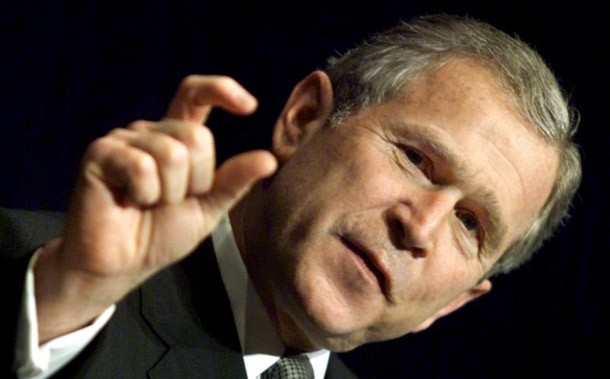 President George W. Bush gestures as he addresses the National Newspaper Association meeting in Washington on March 22, 2001. Bush's tax cuts are set to expire at the end of next year, putting the president and Congress in a tough position. (AP/J. Scott Applewhite)