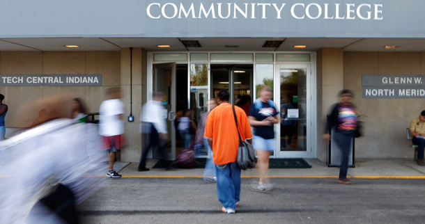 Students move through the entrance to Ivy Tech Community College during a class change in Indianapolis. (AP/Michael Conroy)