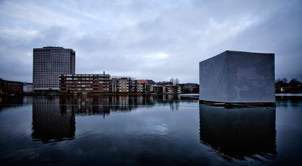 A cube created by Italian artist Alfio Bonanno, displayed on Sankt Jorgenlake during the UN Climate Summit in Copenhagen, represents one metric ton of carbon dioxide. (AP/Jens Panduro)