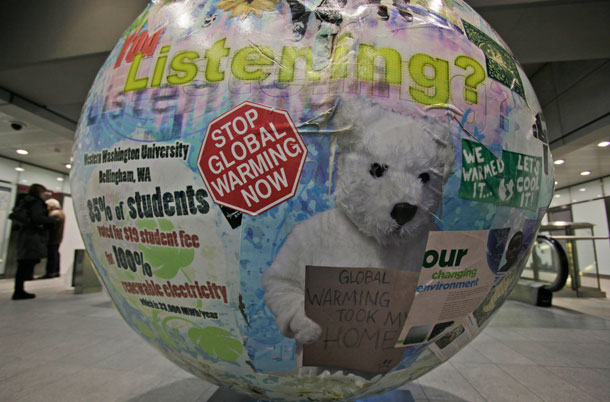 A globe is displayed in a subway station in Copenhagen prior to the start of the international climate summit. (AP/Peter Dejong)