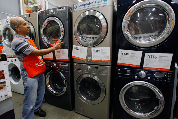 Home Depot Inc., associate John Badalian demonstrates energy efficient washing machines and dryers at The Home Depot store in Glendale, CA. (Center for American Progress)