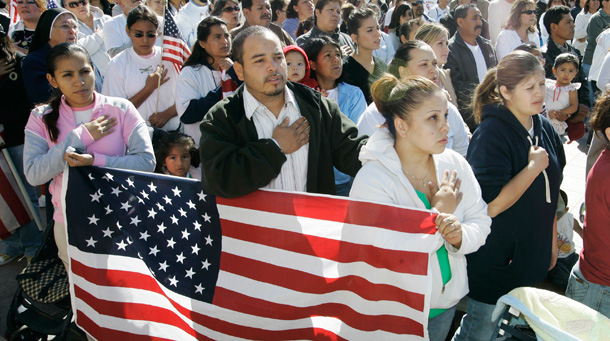 Immigrants say the pledge of allegiance at a rally for comprehensive immigration reform in Oklahoma City. (AP)