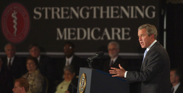 President George W. Bush delivers remarks on Medicare to the Illinois State Medical Society on June 11, 2003 in Chicago. Bush's White House grossly underestimated the cost of Bush's Medicare prescription drug benefit program. (AP/Susan Walsh)