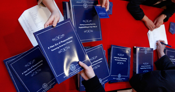 Copies of President Obama's first budget for fiscal 2010 are picked-up at the U.S. Government Printing Office in Washington. (AP/Pablo Martinez Monsivais)