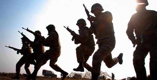 Pakistan army soldiers take part in an exercise in Muzzafargarh near Multan, Pakistan where, along with other security forces, they are engaged with Taliban and al-Qaida militants in Pakistani tribal areas along the Afghanistan border. (AP/Khalid Tanveer)