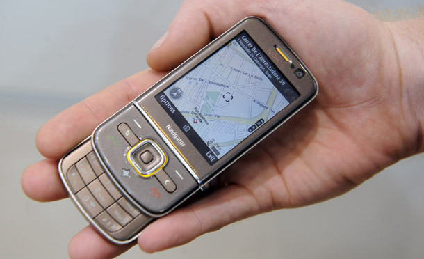 The cell phone—a handy device with energy-saving potential. (AP/Manu Fernandez)