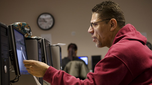 Nick Rodriguez looks at job listings for tow truck drivers in the New York State Labor Department's Division of Employment Services in Brooklyn, NY on January 6, 2010. The U.S. economy shed 85,000 jobs in December 2009, and economic policy must ensure strong job growth either through direct public investments or by encouraging private-sector firms to do more. (AP/Mark Lennihan)