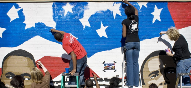 Volunteers paint a mural of Dr. Martin Luther King and President Barack Obama as part of a National Day of Service on January 19, 2009 in Houston, TX. Volunteering projects that help communities and the climate are available across the country. (AP/Eric Kayne)