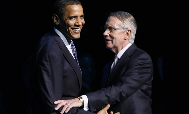 President Barack Obama stands with Senate Majority Leader Harry Reid (D-NV) at a fundraising event in Las Vegas. A new book quotes Reid describing Obama as “light skinned” and “with no Negro dialect, unless he wanted to have one.” Obama accepted Reid's apology and considers the matter closed. (AP/Charles Dharapak)