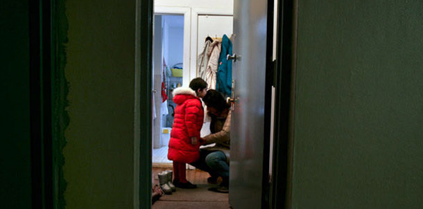 Understanding the disconnect between Americans' widespread concern over work-family conflict and their policymakers' inability to pass legislation to address this issue requires a portrait of why work-family conflict is so acute today. (AP/Dima Gavrysh)
