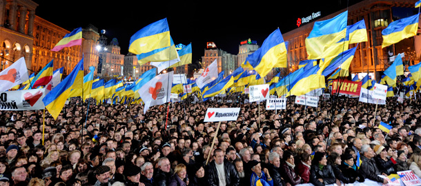 Thousands of supporters for Ukrainian Prime Minister Yulia Tymoshenko participate in a mass rally in Kyiv's central Independence Square. (AP/Sergei Chuzakov)