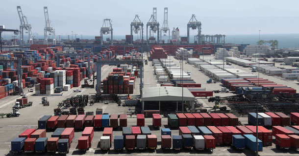 In this August 12, 2009 photo, containers are shown stacked and ready for export at the Port of Long Beach, California. U.S. exports have grown strongly since the spring of 2009, but our economy is not reaping the full benefits of more exports in terms of shrinking trade deficits and more job creation. (AP/Nick Ut)