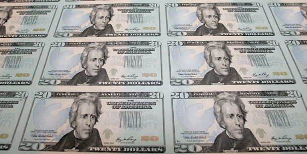 New 2006 $20 currency notes are seen at the Bureau of Engraving and Printing in Washington. Getting our country back on a sustainable fiscal path will require the president, Congress, and the public to make tough choices. (AP/J. Scott Applewhite, File)