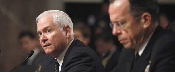 Defense Secretary Robert Gates and Joint Chiefs Chairman Adm. Michael Mullen testify on Capitol Hill during a hearing on