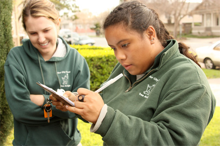 Our City Forest AmeriCorps members hit the streets to doorknock in San Jose neighborhoods, encouraging residents to apply for their free street tree though the Trees for All program. (Flickr/Our City Forest)