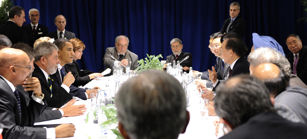 U.S. President Barack Obama is joined by other leaders, including Brazilian President Inacio Luiz Inacio Lula da Silva, Chinese Prime Minister Wen Jiabao, and Indian Prime Minister Manmohan Singh in a multilateral meeting at the United Nations Climate Change Conference at the Bella Center in Copenhagen, Denmark on December 18, 2009. (AP/Susan Walsh)