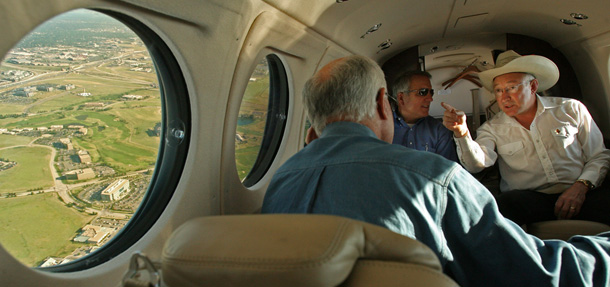 Interior Secretary Ken Salazar discusses oil and gas drilling on the western slope of Colorado while touring existing drilling projects in the area. (AP/Matt McClain)