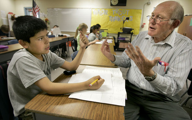 The issue of teacher tenure, or “continuing contracts,” has received less attention despite its potential importance to efforts to improve teacher quality. (AP/Jae C. Hong)