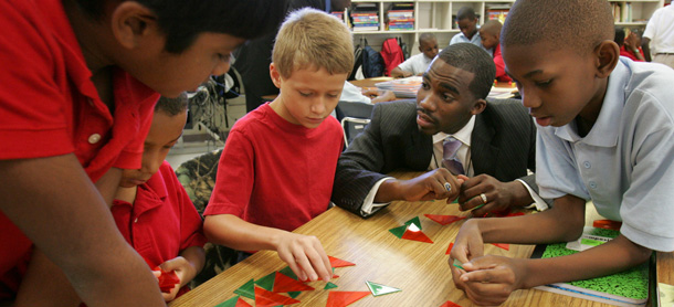 Hayward Jean works with his fourth grade students during a math lesson on patterns at Marshall Elementary School in Orangeburg, South Carolina. (AP/Mary Ann Chastain)