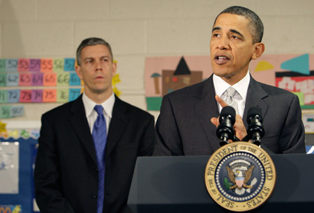 President Barack Obama, accompanied by Education Secretary Arne Duncan, speaks after a discussion with 6th grade students at Graham Road Elementary School in Falls Church, Virginia on January 19, 2010. (AP/Alex Brandon)