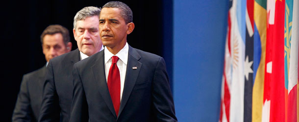 President Barack Obama is followed by British Prime Minister Gordon Brown and French President Nicolas Sarkozy during the G-20 Summit in Pittsburgh. When President Obama inherited a financial crisis that threatened to sink the world economy, he turned to the world's big economies to coordinate a solution. (AP/Gerald Herbert)