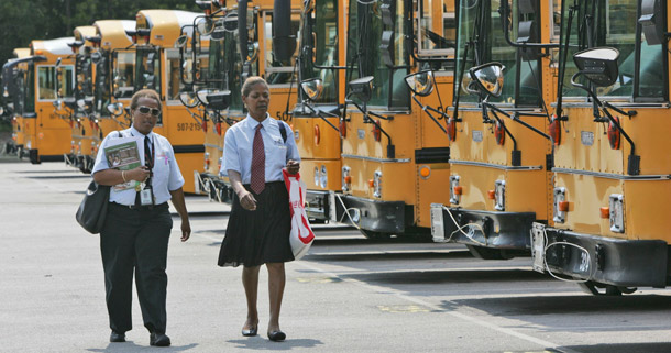School bus drivers are some of the many jobs often contracted out by local governments. (AP/Mary Ann Chastain)